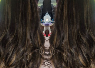 Beautiful flowing hair with highlights at Annabel Hair in Sandbach, England, GB, showcasing a luxurious finish.