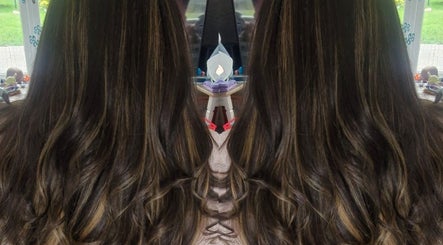 Beautiful flowing hair with highlights at Annabel Hair in Sandbach, England, GB, showcasing a luxurious finish.