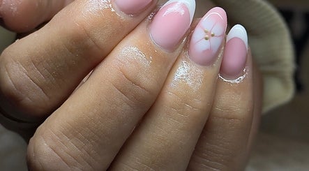 Elegant pink manicure with floral accents at ER nails, Worsley, England, GB.
