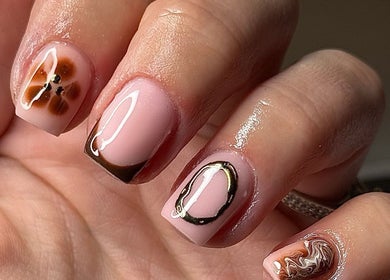Close-up of intricate nail designs at ER nails, Worsley, England. Perfectly styled with creative patterns.