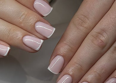 Elegant French manicure at ER nails, located in Worsley, England, GB. Perfectly polished and stylish.