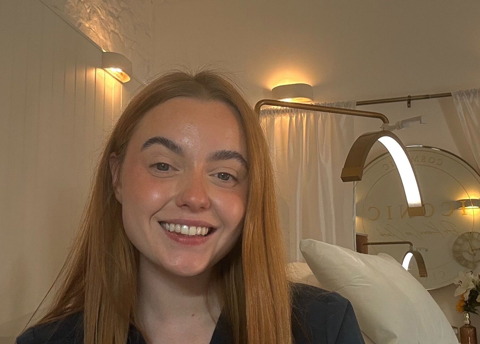 Warm ambiance at The Orielle Clinic (Glasgow), Clarkston, Scotland, GB with a welcoming staff member.