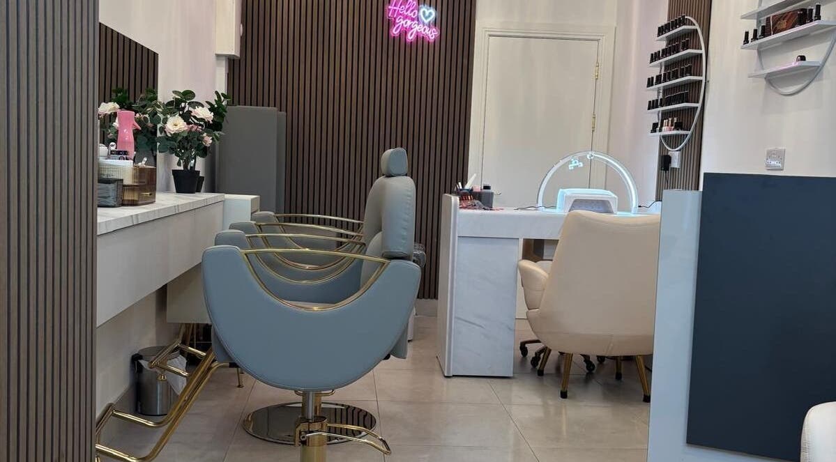 Modern salon interior at Nail & Brow Bar Mullingar, Mullingar, IE, featuring chic chairs and stylish decor.