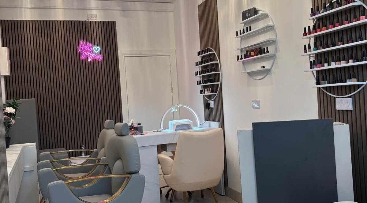 Stylish interior of Nail & Brow Bar Mullingar, Mullingar, IE with elegant chairs and nail polish display.