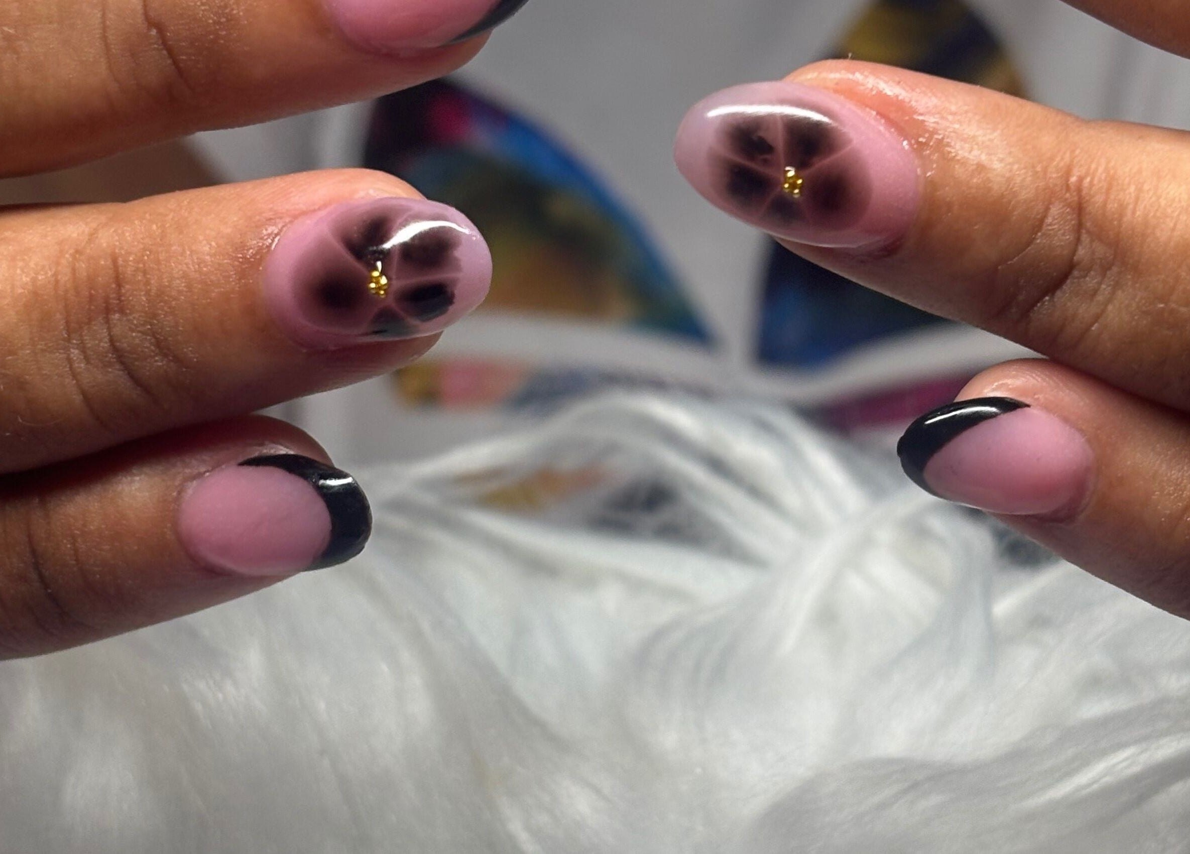 Close-up of elegant floral nail art at TayTips, Montego Bay, St. James Parish, JM.