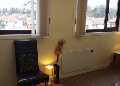 Cozy seating area at Diverse Wellbeing Services Ltd., Rochdale, England, GB with a scenic window view.