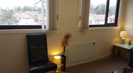 Cozy seating area at Diverse Wellbeing Services Ltd., Rochdale, England, GB with a scenic window view.