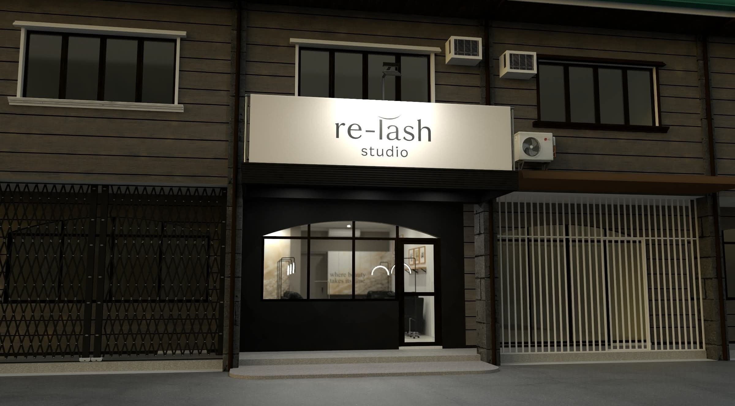 Front exterior of Relash Eyelash Studio in Quezon City, Metro Manila, PH at night.