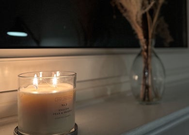Warm candlelight ambiance at Pretty Little Nails, Reigate, England, GB.