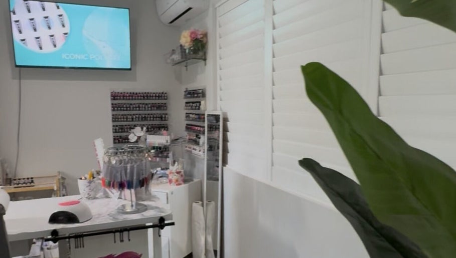 Modern nail studio at Nailsby Nikki, Burpengary East, QLD. Chic decor and polish selection displayed beautifully.