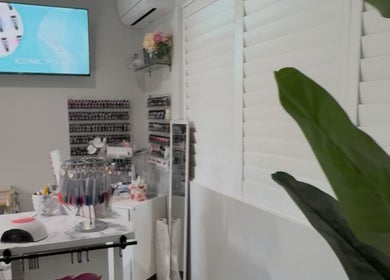 Modern nail studio at Nailsby Nikki, Burpengary East, QLD. Chic decor and polish selection displayed beautifully.