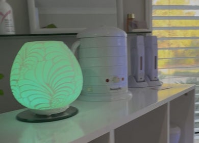 A serene green lamp and soothing equipment at Nailsby Nikki, Burpengary East, Queensland, AU showcase tranquility.
