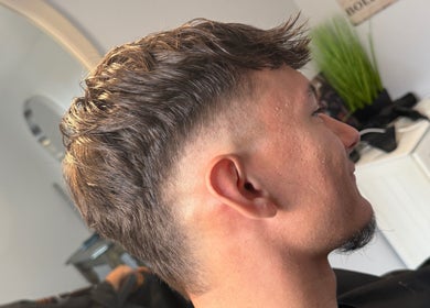 Stylish haircut for men at Beau Brims, Copthorne, England, GB showcasing modern grooming.