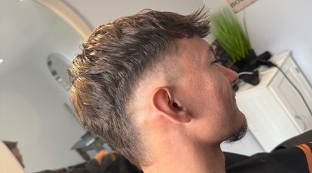 Stylish haircut for men at Beau Brims, Copthorne, England, GB showcasing modern grooming.