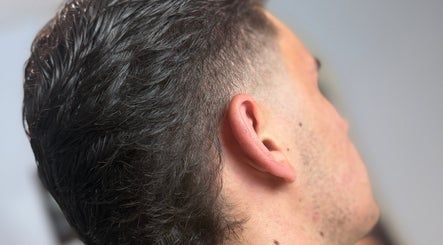 Close-up of a trendy fade haircut at Beau Brims, Copthorne, England, GB.
