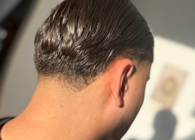 Sleek haircut from Beau Brims, Copthorne, England, showcasing a trendy style.