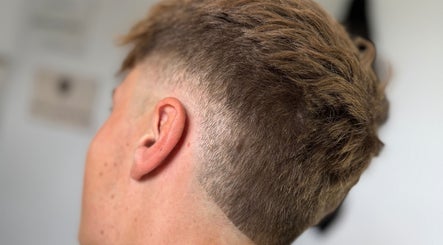 Close-up of sleek fade haircut at Beau Brims, Copthorne, England, GB highlighting precision and style.