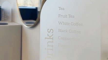 Elegant drink menu at HairByMadi, Bradford, England, GB, offering tea, coffee, and cappuccino options.