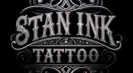 Logo artistico Stan Ink Tattoo a Lissone, Lombardia, IT con design ornamentale.