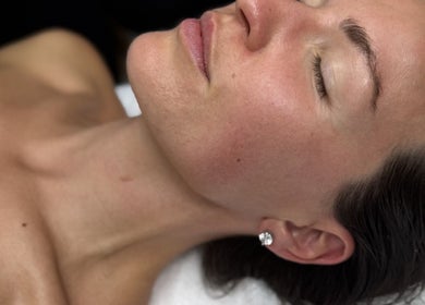 Facial treatment at Sculpt & Reset by H, Broxbourne, England, GB. Woman relaxed with closed eyes.