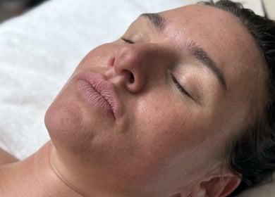 Close-up of a woman enjoying a facial at Sculpt & Reset by H in Broxbourne, England, GB.