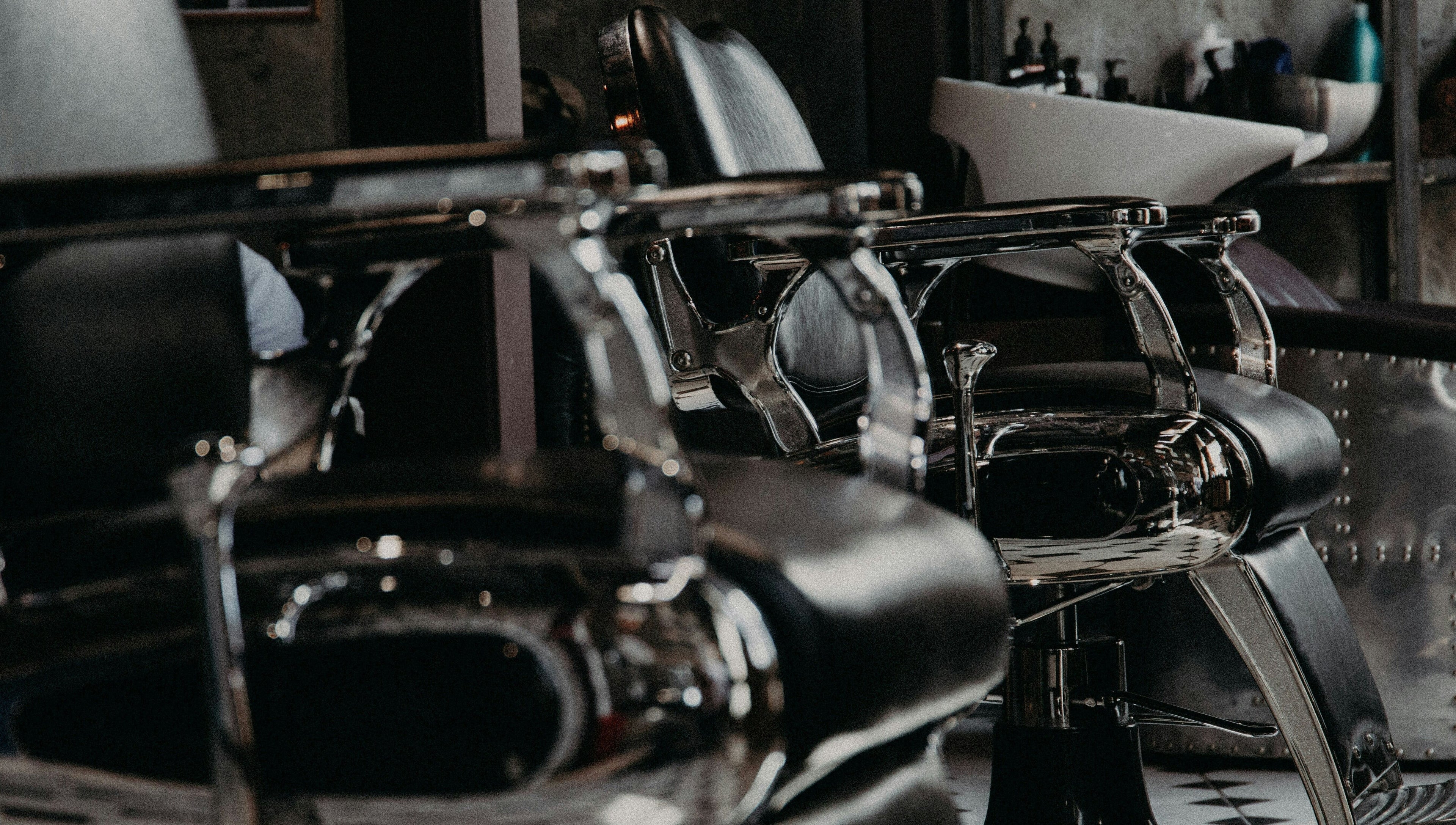 Modern barber chairs at Themonopolybarbershop in Sofia, Sofia City Province, BG, showcasing sleek design.