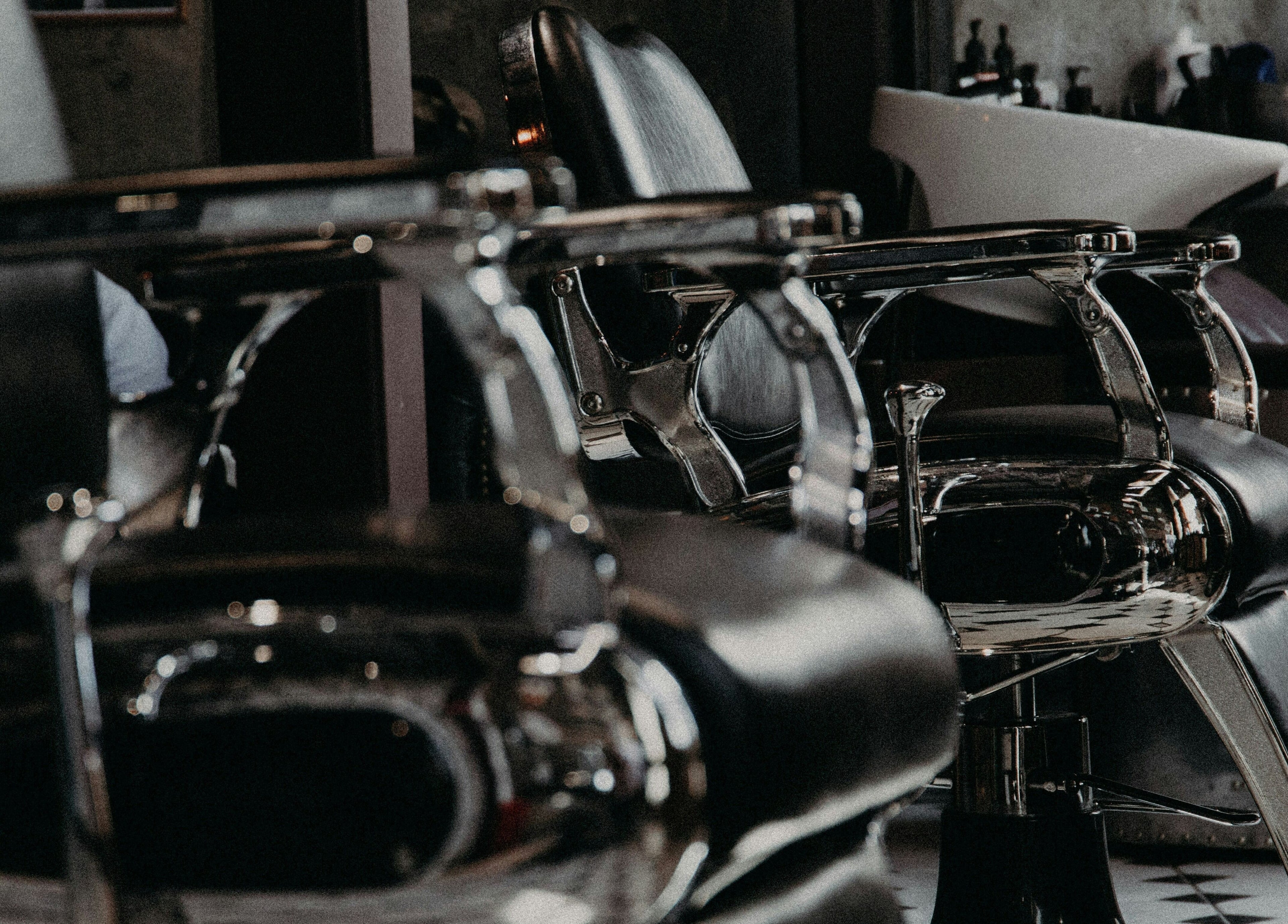 Modern barber chairs at Themonopolybarbershop in Sofia, Sofia City Province, BG, showcasing sleek design.