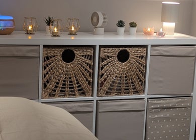 Cozy nook at Axiom Nature, London, England, GB with woven baskets, ambient lighting, and soothing decor.