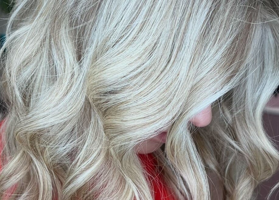 Elegant blonde curls styled at Hair by Gillian Edmonstone, Banchory, Scotland, GB.
