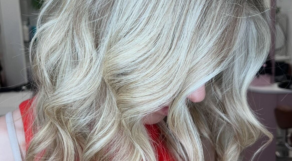 Elegant blonde curls styled at Hair by Gillian Edmonstone, Banchory, Scotland, GB.