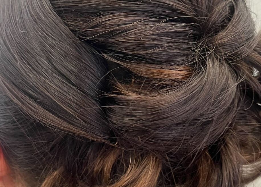 Beautiful braided updo hairstyle at Hair by Gillian Edmonstone in Banchory, Scotland, GB.