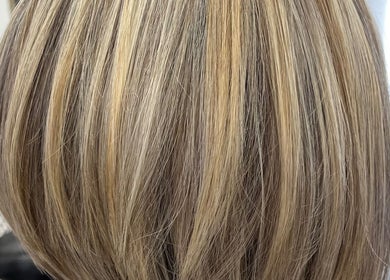 Golden highlights hairstyle at Hair by Gillian Edmonstone in Banchory, Scotland, GB.