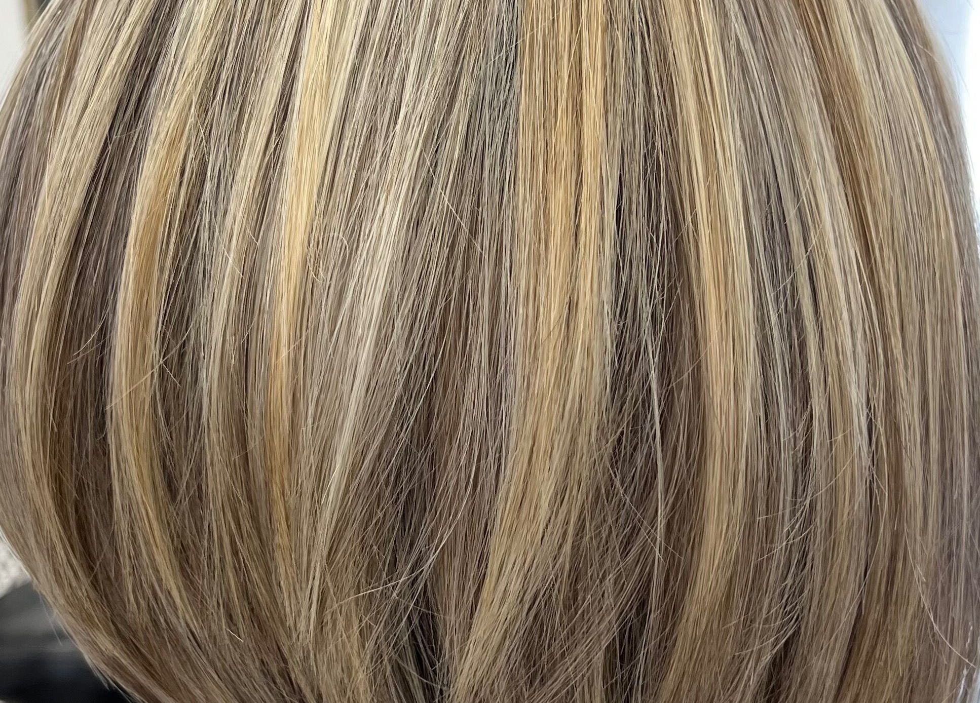 Golden highlights hairstyle at Hair by Gillian Edmonstone in Banchory, Scotland, GB.