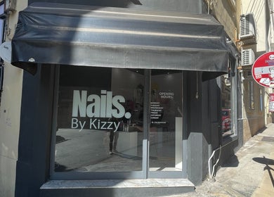 Front view of Nails by Kizzy, a beauty salon in Tas-sliema, MT showcasing its sleek storefront.