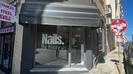 Front view of Nails by Kizzy, a beauty salon in Tas-sliema, MT showcasing its sleek storefront.
