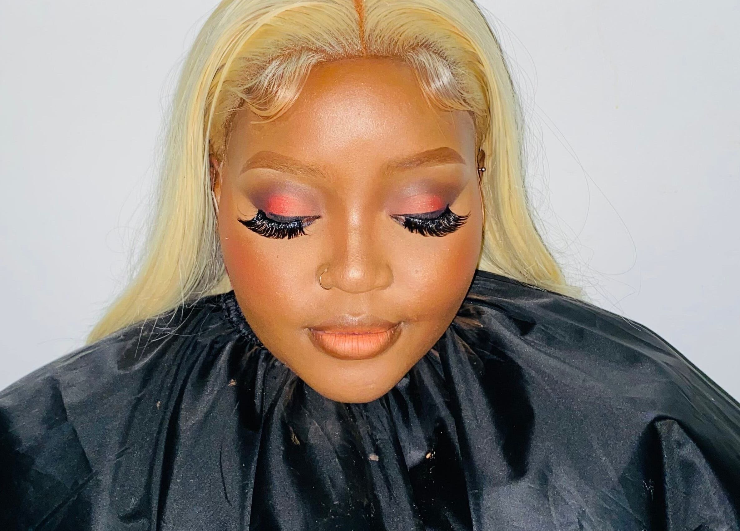 Elegant makeup look at Diyasi’s Beauty in Pretoria, Gauteng, ZA, showcasing vibrant eyeshadow and bold lashes.