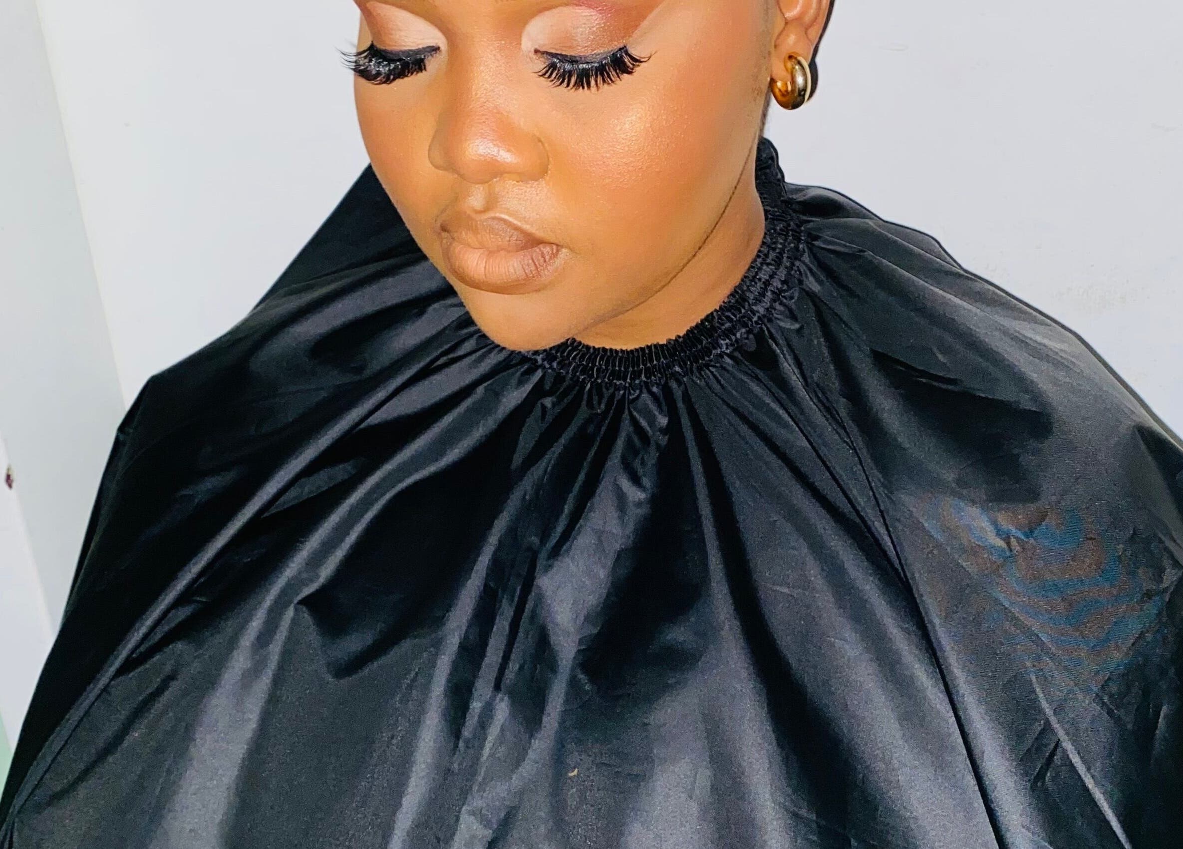 A client with glamorous makeup at Diyasi’s beauty, Pretoria, Gauteng, ZA, showcasing elegant eye and lip artistry.