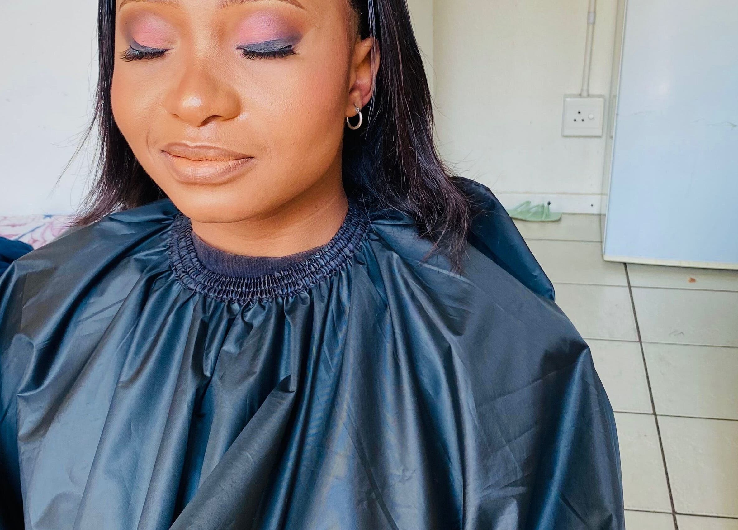 A serene woman enjoys a flawless makeup session at Diyasi’s beauty, Pretoria, Gauteng, ZA.