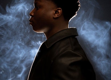 Profile silhouette against smoky background at Kyu the barber, Charlottetown, Prince Edward Island, CA.