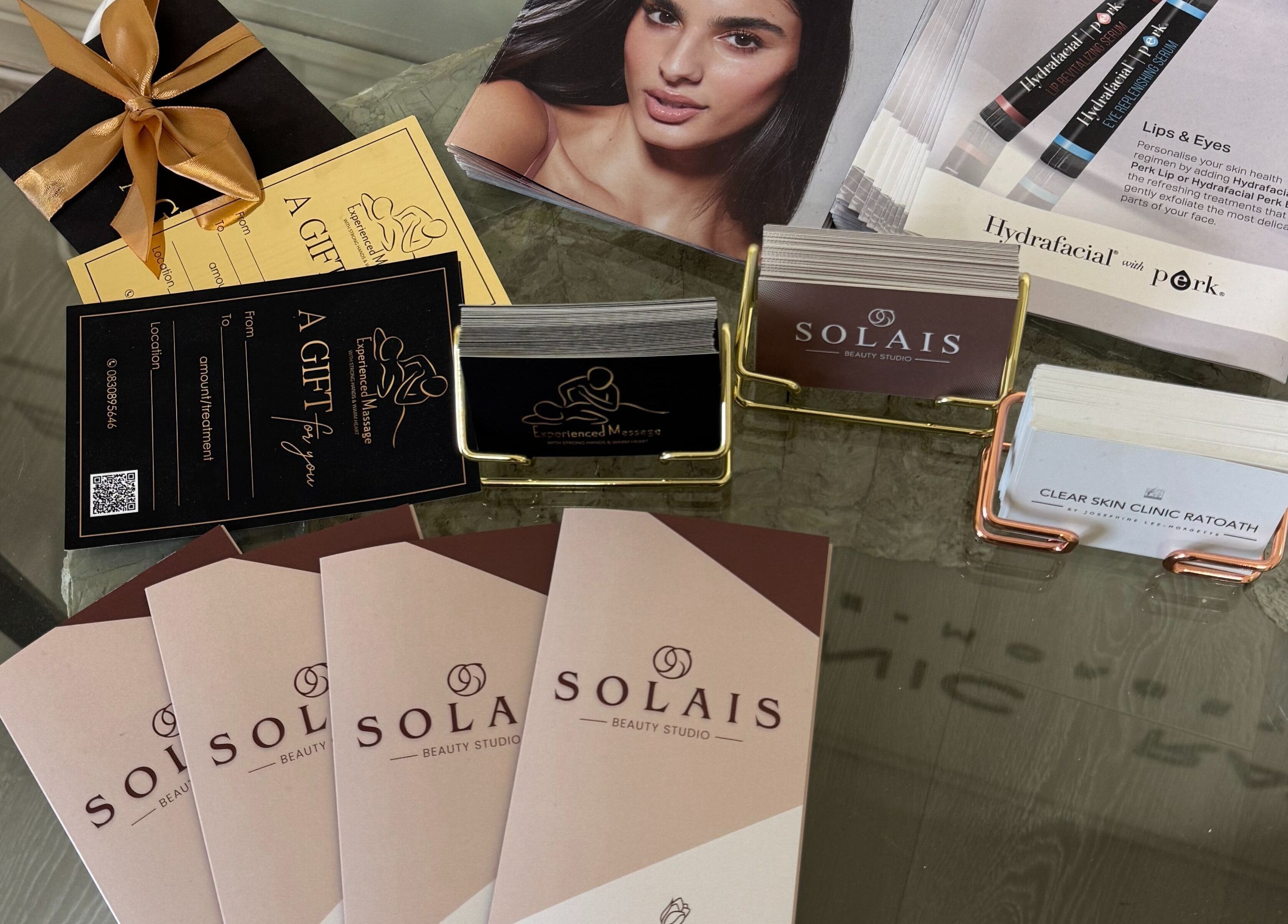 Brochures and cards at Solais Beauty Studio, Ratoath, IE, showcasing services and offers.