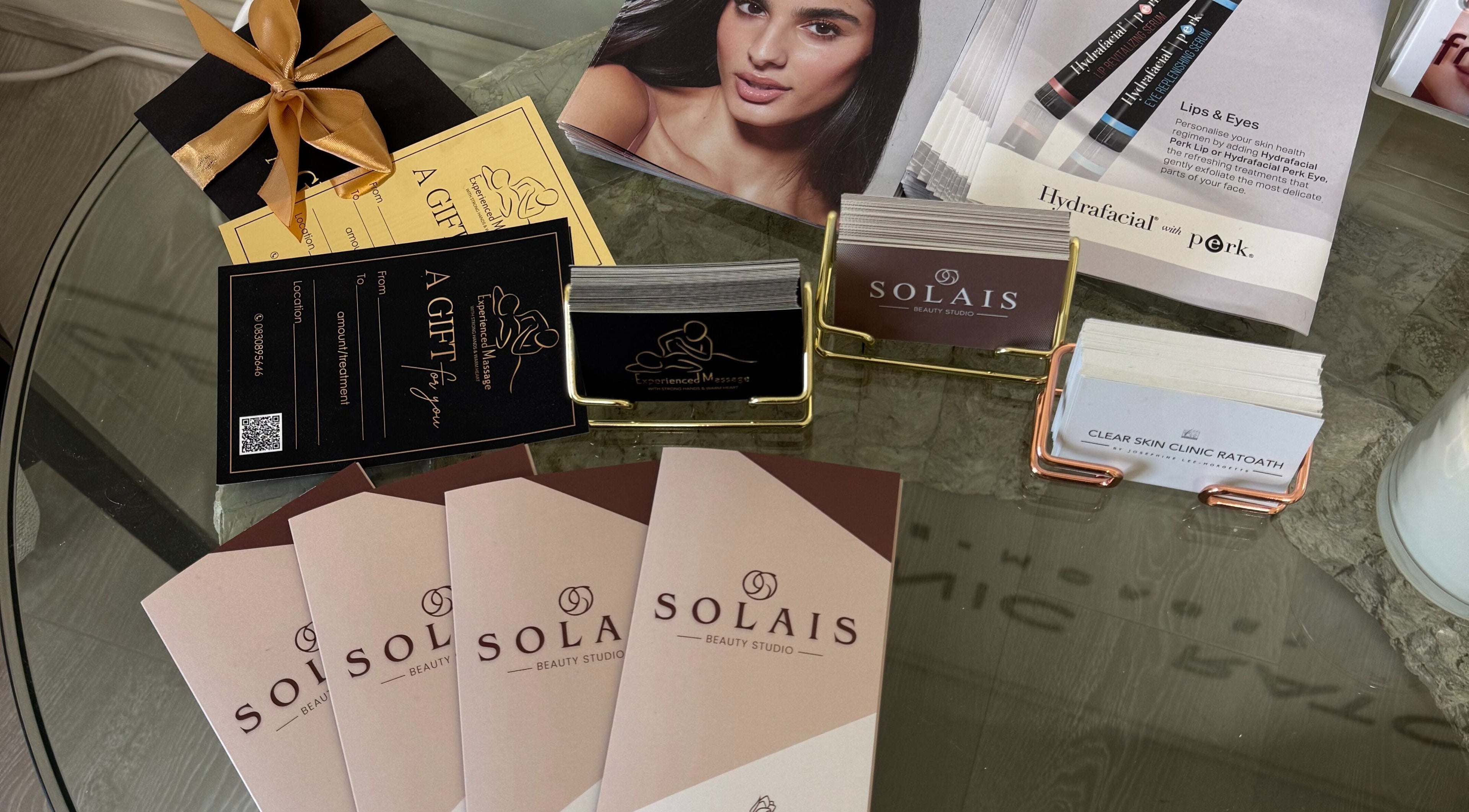 Brochures and cards at Solais Beauty Studio, Ratoath, IE, showcasing services and offers.
