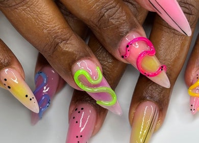 Colorful abstract nail designs at Mid City Nails, Los Angeles, California, US showcasing vibrant creativity.