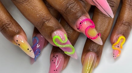 Colorful abstract nail designs at Mid City Nails, Los Angeles, California, US showcasing vibrant creativity.