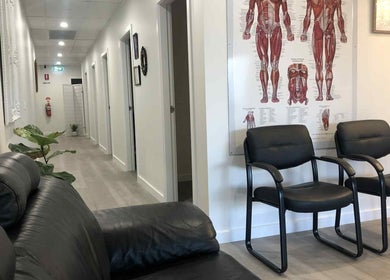 Modern waiting area at SENSES WELLNESS INVERELL, Inverell, New South Wales, AU featuring sleek black chairs.