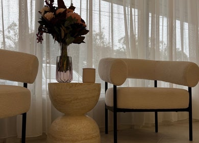 Cozy seating with floral decor at Haute Hair By Shelbie-Marie, Melbourne, Victoria, AU.