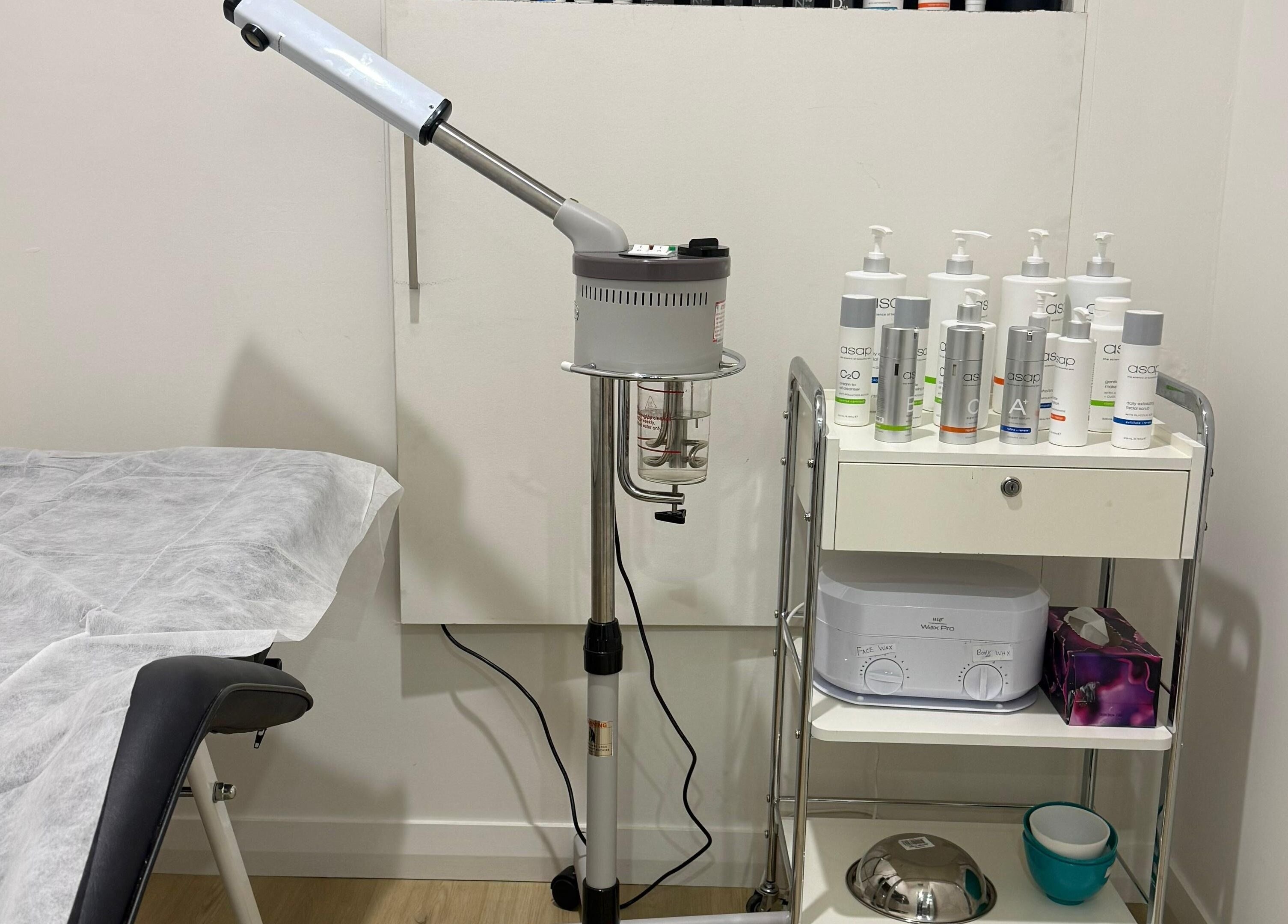 Luxurious treatment room at Glam up and Glow, Gilles Plains, South Australia, AU featuring skincare products.