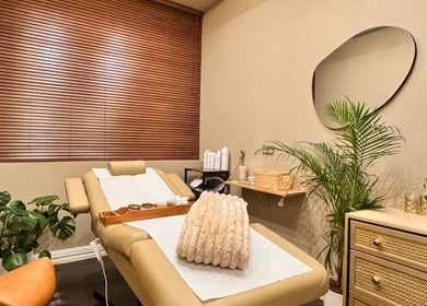 Relaxing treatment room at Therapy by aq in Birmingham, England, GB, featuring a comfortable massage bed.