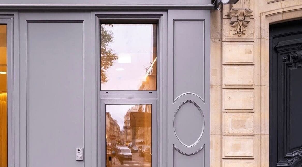 Elegant exterior of McKenzie Chun in Paris, Île-de-France, FR showcasing modern design.