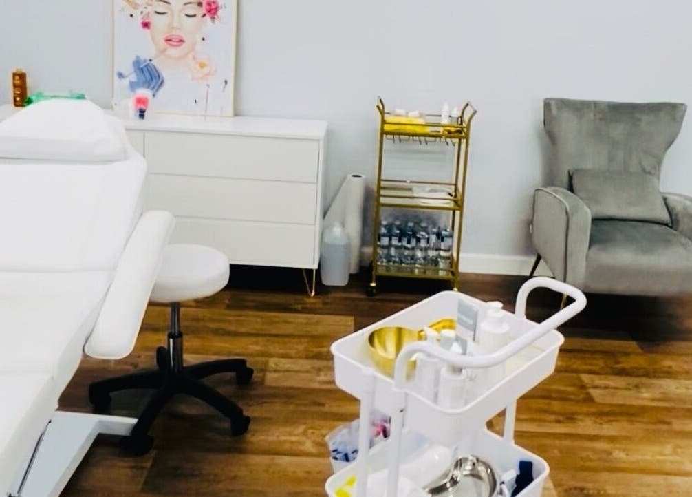 Modern treatment room at MGB Aesthetic Clinic, Greater, England, GB, featuring sleek furnishings and relaxing ambiance.