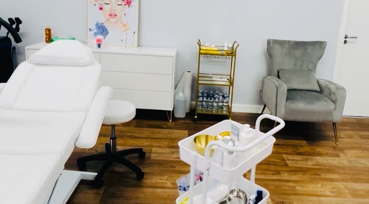 Modern treatment room at MGB Aesthetic Clinic, Greater, England, GB, featuring sleek furnishings and relaxing ambiance.